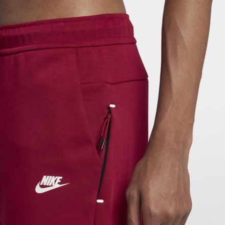 red nike tech shorts