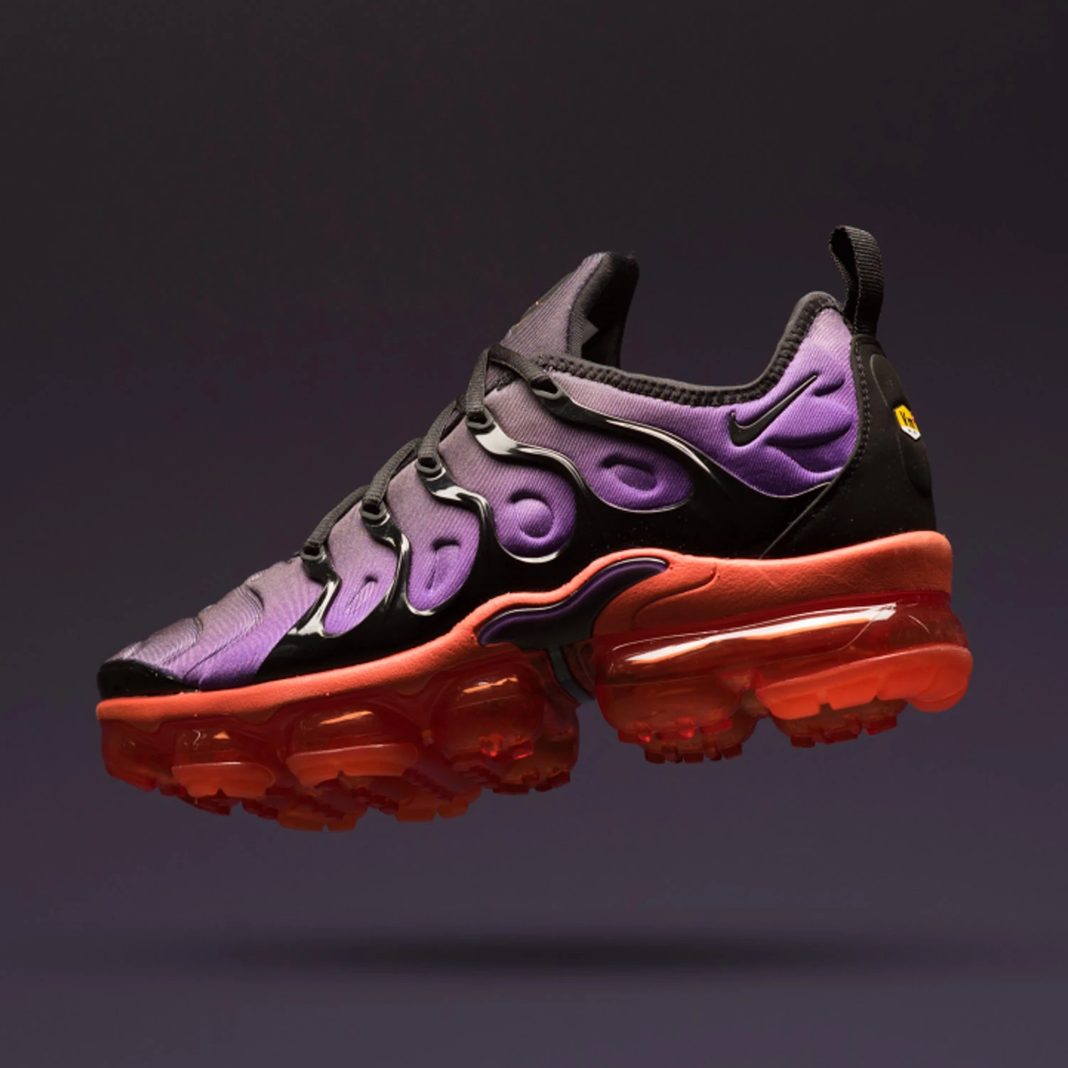 red and purple vapormax plus