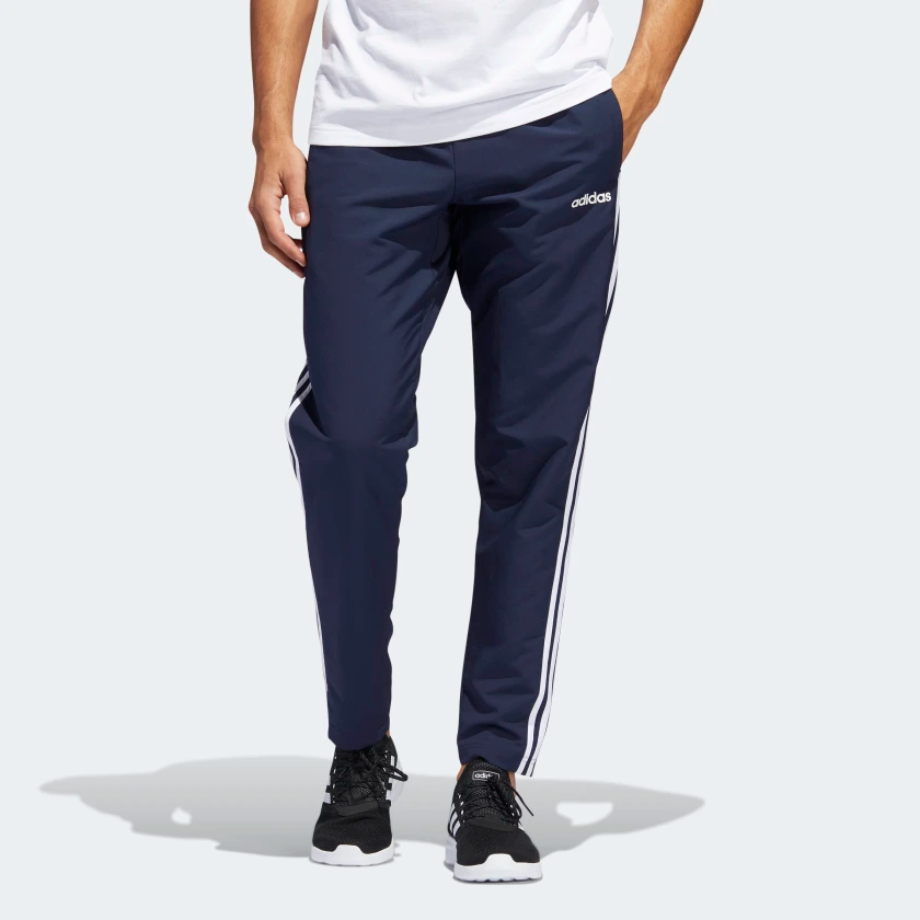 Essentials_3_Stripes_Pants_Blue_FI7163_21_model.png