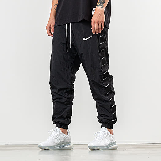 45% OFF the Nike Swoosh Taped Logo Woven Pants "Black" Sneaker Shouts