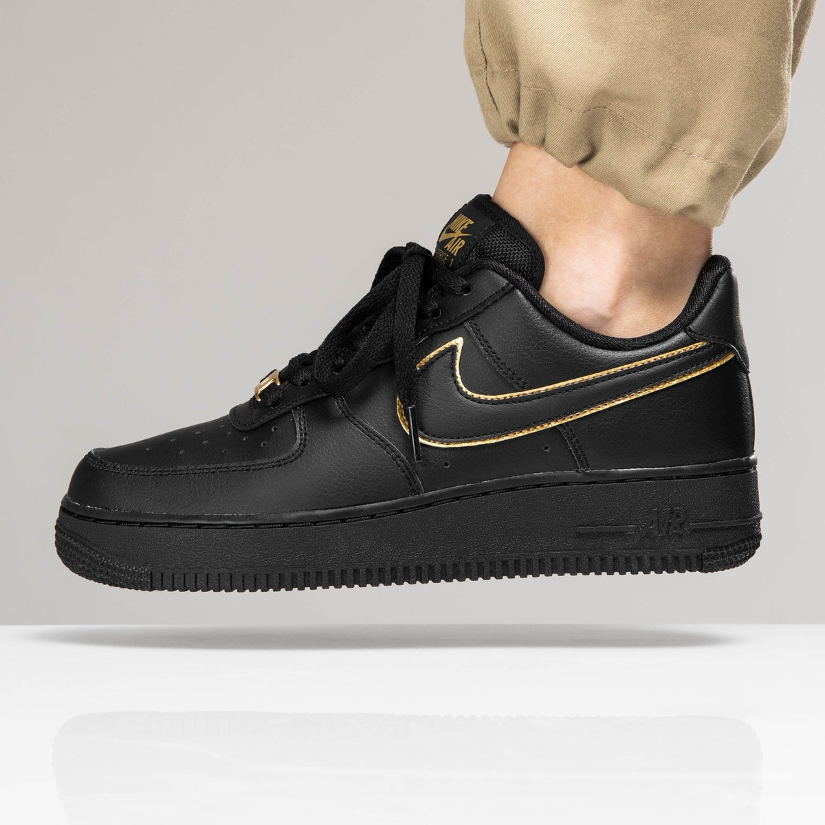 nike air force 1 low black and gold
