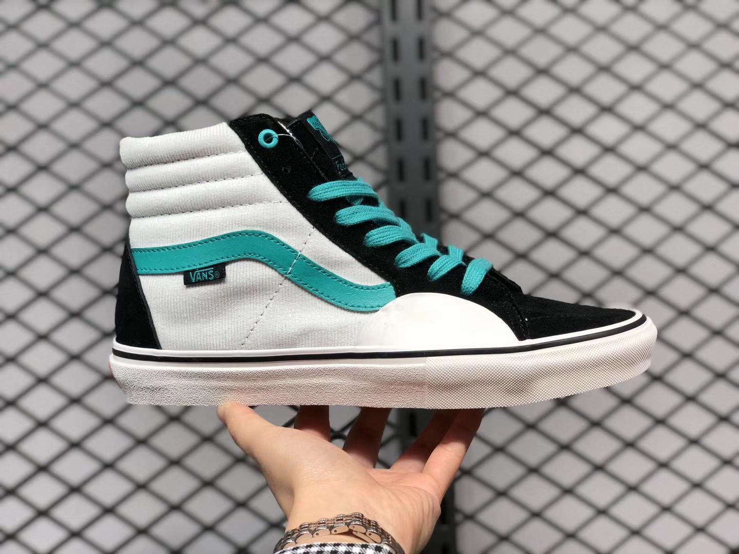 teal and gray vans