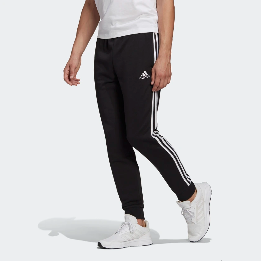 Essentials_French_Terry_Tapered_Cuff_3-Stripes_Pants_Black_GK8831_21_model.png