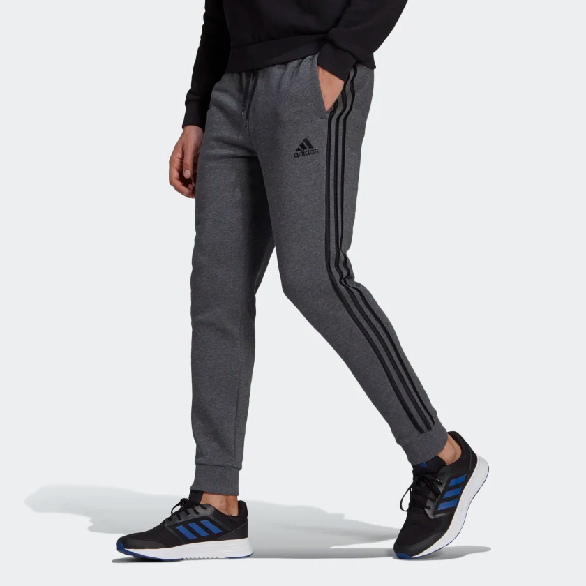 Essentials_French_Terry_Tapered-Cuff_3-Stripes_Pants_Grey_GK8826_21_model.png
