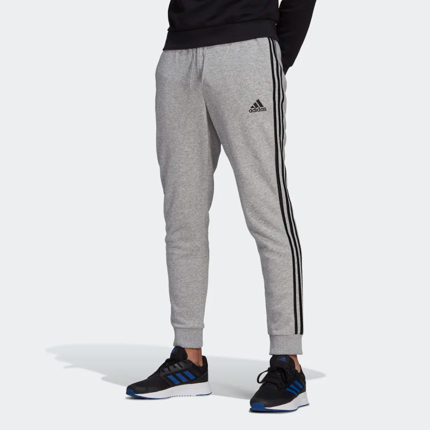 Essentials_French_Terry_Tapered-Cuff_3-Stripes_Pants_Grey_GK8824_21_model.png