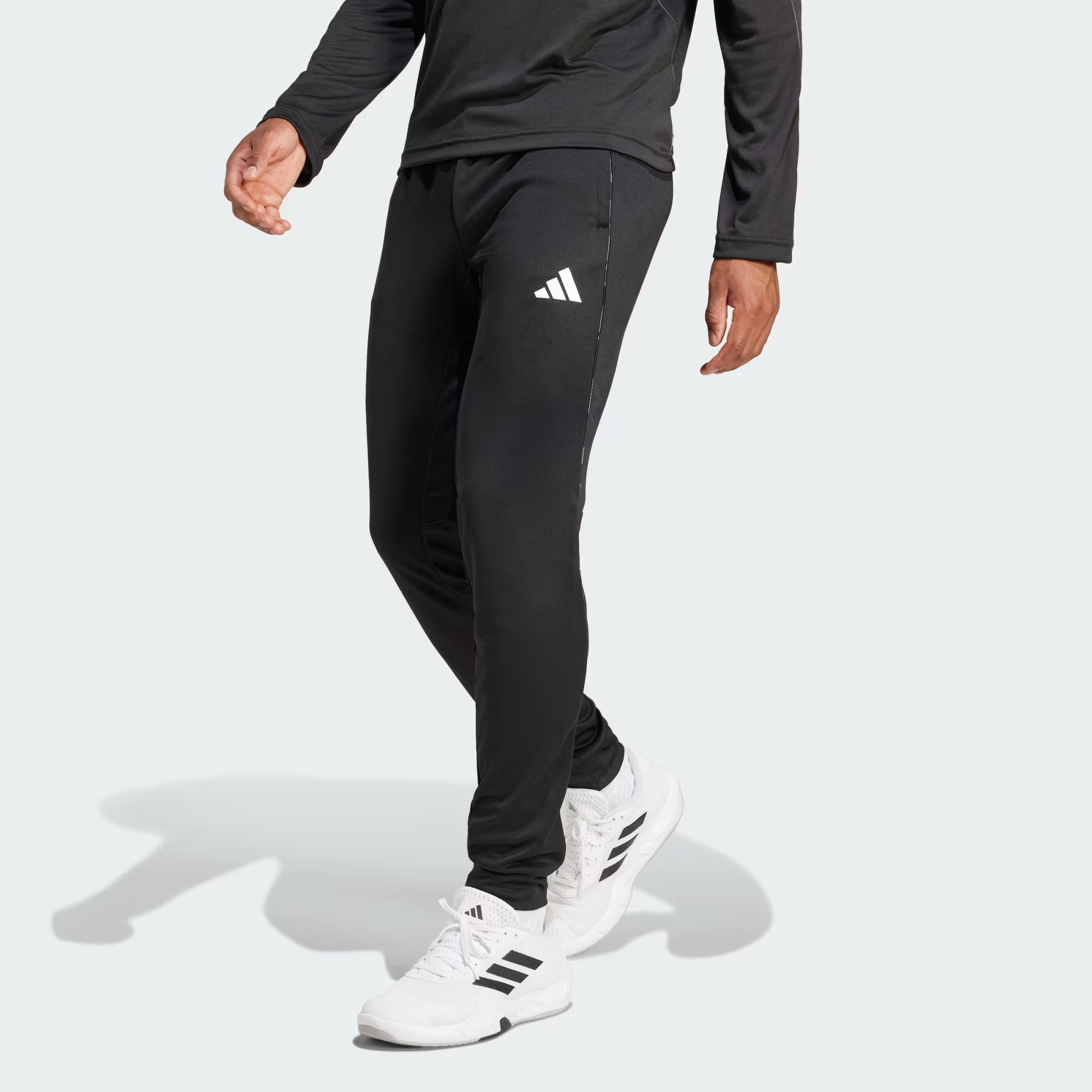 Essentials_Camo_Pants_Black_JE5698_21_model.png