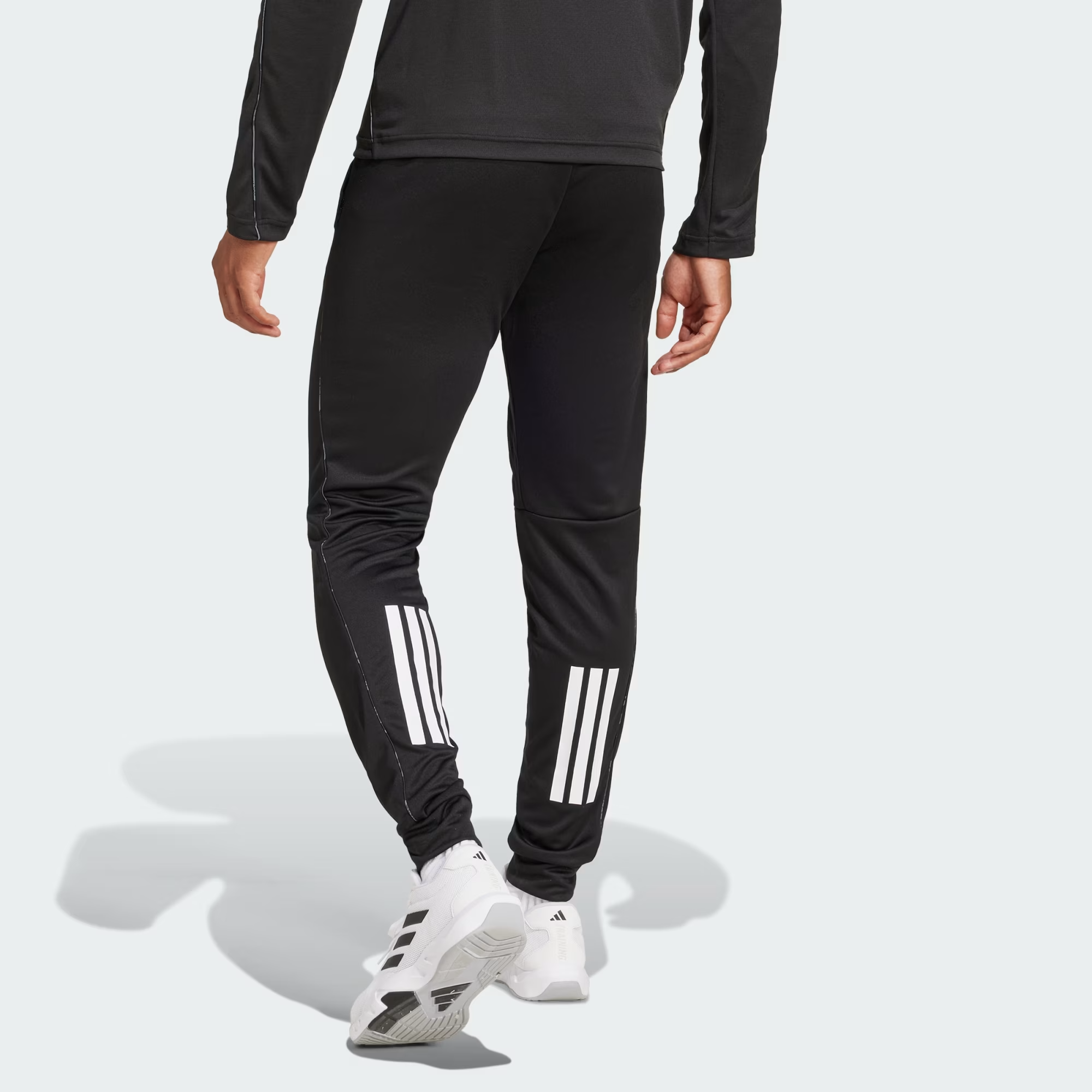 Essentials_Camo_Pants_Black_JE5698_23_hover_model.png