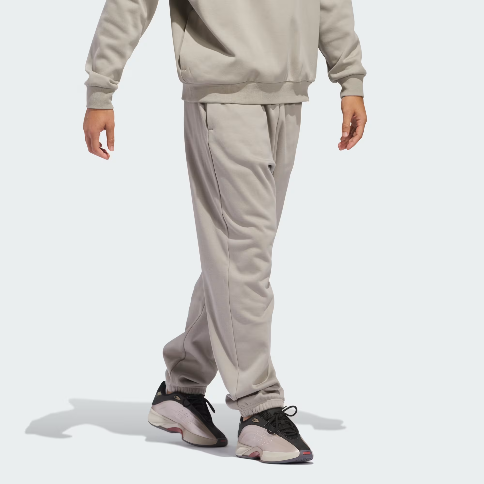 adidas_Basketball_Fleece_Joggers_Gender_Neutral_Beige_JC7845_25_model.png