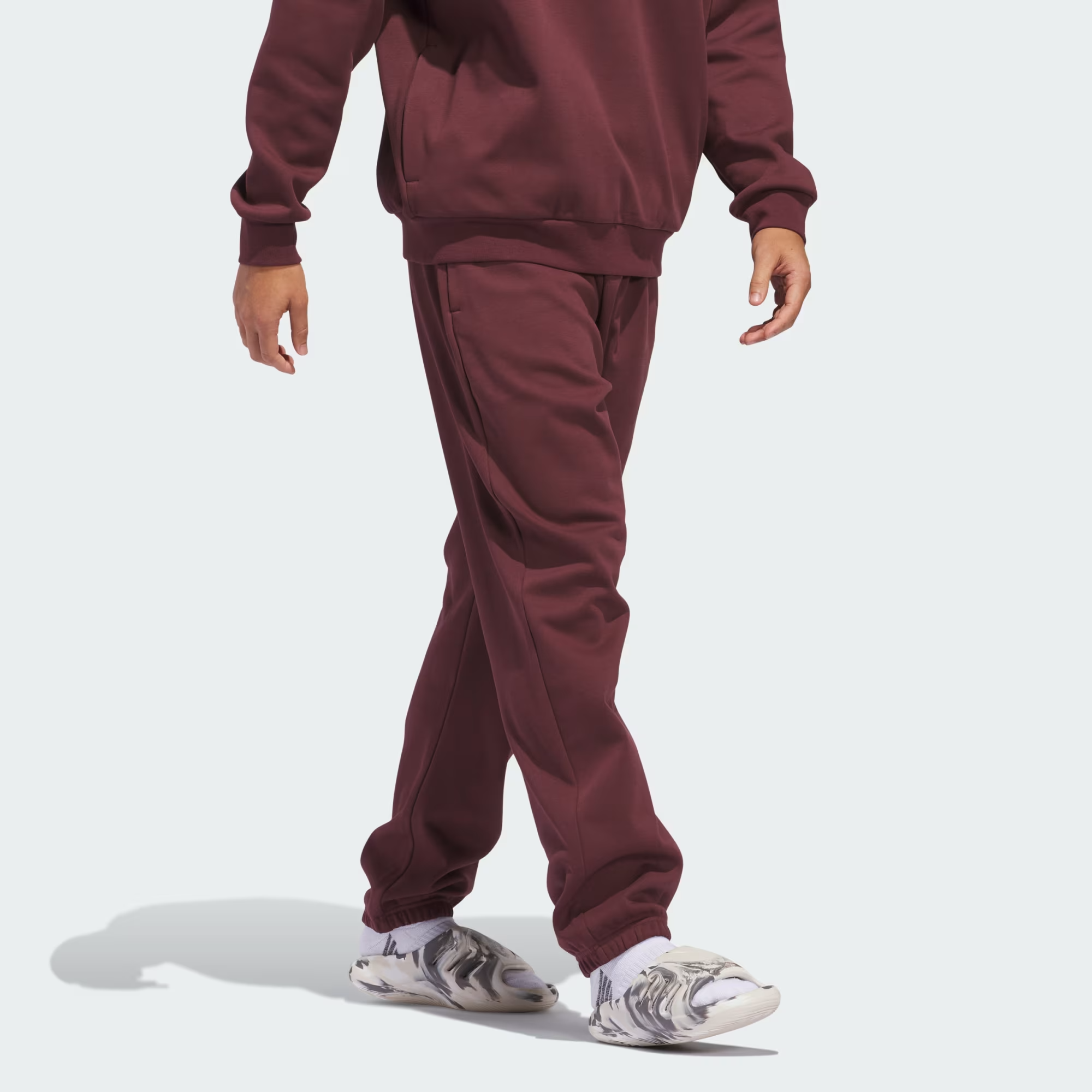 adidas_Basketball_Fleece_Joggers_Gender_Neutral_Burgundy_JD6144_25_model.png