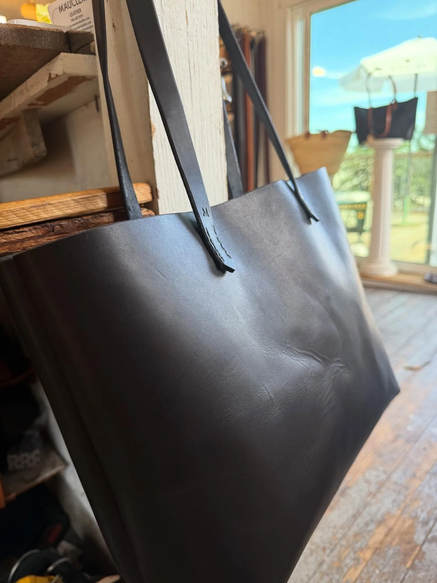 So simple.  Black on black original tote.  #MAUCL&Egrave;RELeather #leather #mauclere #OGtote #prefecttote #simple #stunning #handmade #tote #leathertote #blackonblack #blackleathertote #handstitched #provincetown #madetolast #lifetimebag