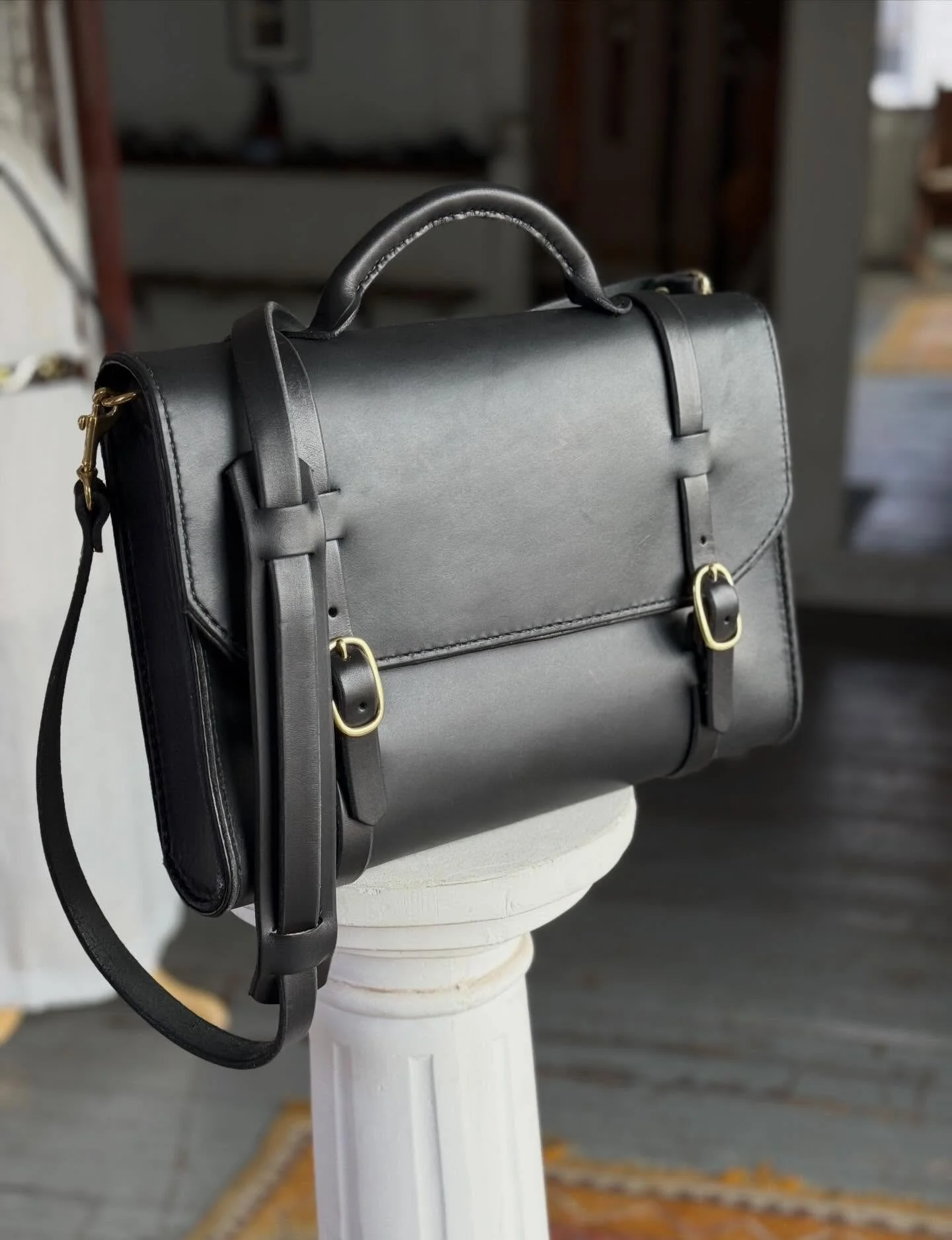 You can never go wrong with black. Always elegant, intimate, and fierce. Everything you would want for a lifelong work bag. This briefcase highlights every single technique that Victor Powell ever taught me. Every finishing detail that heightens the 