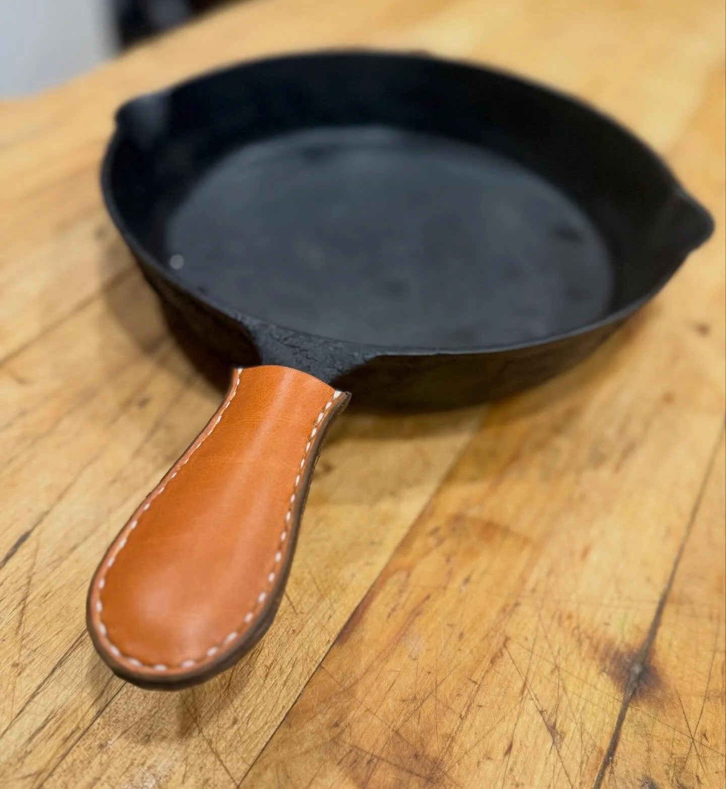 The most useful thing I&rsquo;ve ever made. This cast iron pan is now burn proof and stylish. #MAUCL&Egrave;RELeather #castironcookware #leathersleeve #provincetown #gorgeousandpratical