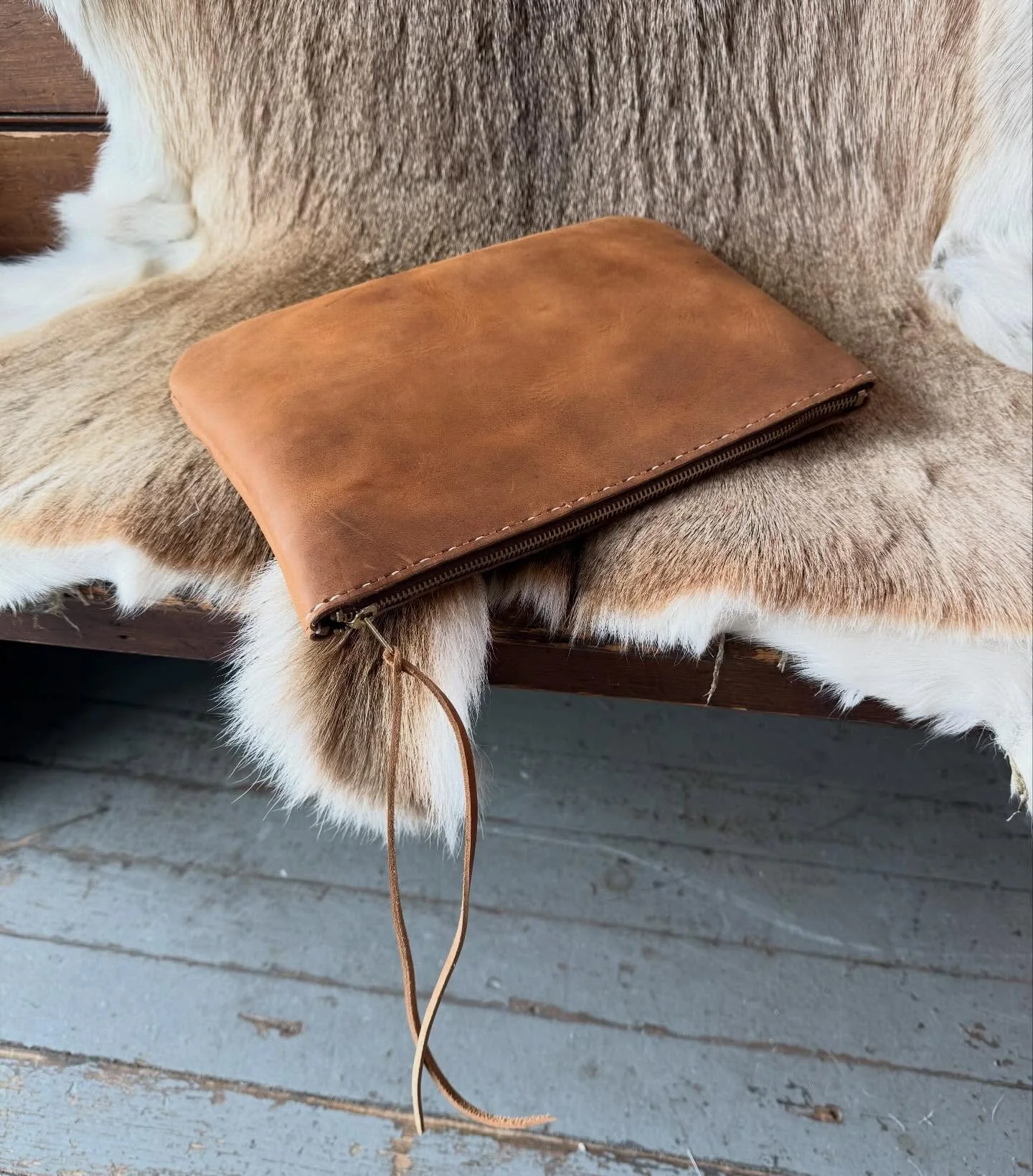 The Zipper Clutch is a perfect place to hold all of your important things. I use mine to keep my phone, wallet, extra cards and keys in an easy to reach place and throw it in my large tote bag. It&rsquo;s also very practical if I need to run a quick 