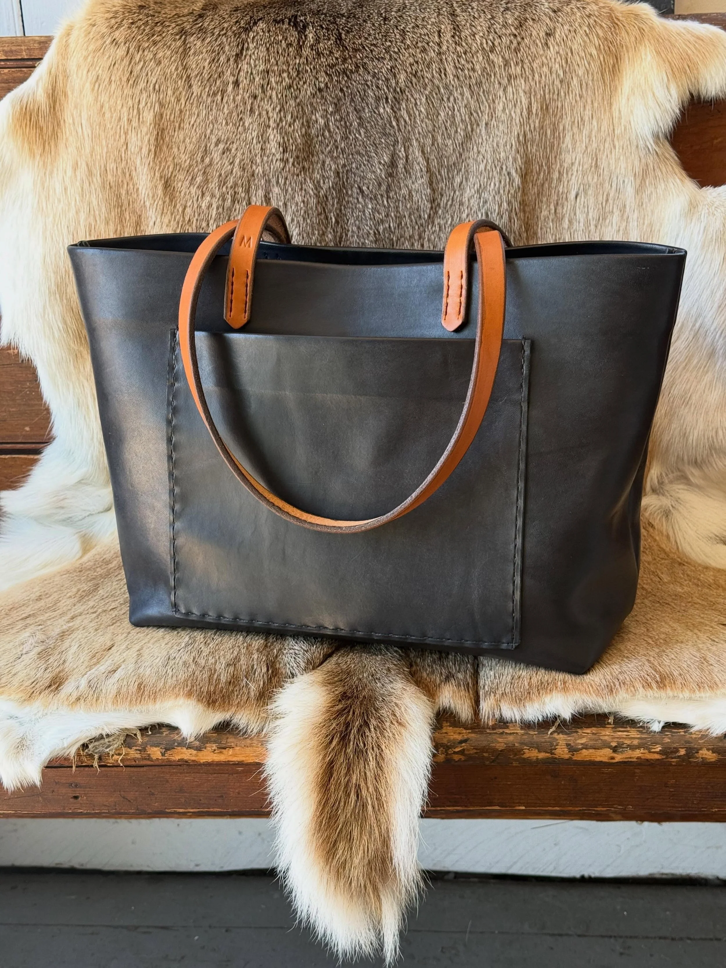 The first time I bought Lamb suede, I was disappointed to find out how easily it would stain. I decided to make myself a personal bag so that it wasn&rsquo;t a complete waste of material. Before I started, I experimented with the skin before cutting 
