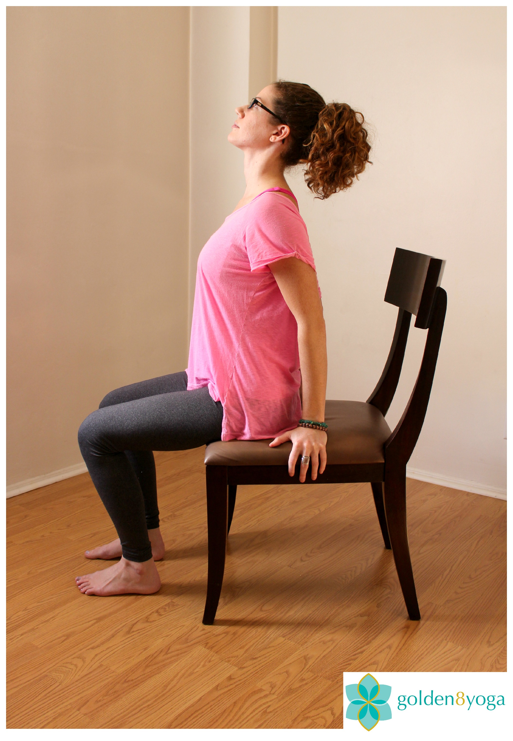 SEATED BACKWARDS BEND Try this pose if you have stiffness in your back and tension in your shoulders. Benefits include increased mobility in the back and shoulders, and relieves shoulder and back tension. 1. Sit comfortably in a chair with your feet hip width distance and parallel to each other. Sit up tall with your back, neck and head in a straight line and shoulders relaxed. 2. Place both hands on the chair underneath or slightly behind your shoulders with elbows slightly bent. Inhale here. 3. Exhale and press your hands into the chair and gently bend your torso backwards. Keep your head in line with your back with your gaze looking up towards the ceiling. 4. Hold this pose for a few seconds breathing normally, then on your next inhale slowly return to your starting seated position and repeat on the second side. **Tip: Be careful not to drop your head back too far as it can constrict your breathing and cause strain on your neck. Only tilt your head back as far as it feels comfortable on your neck**