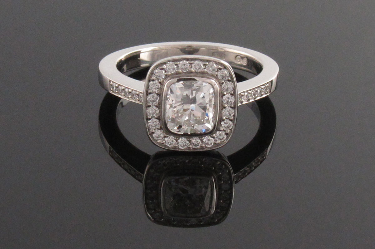 Cushion cut diamond engagement ring