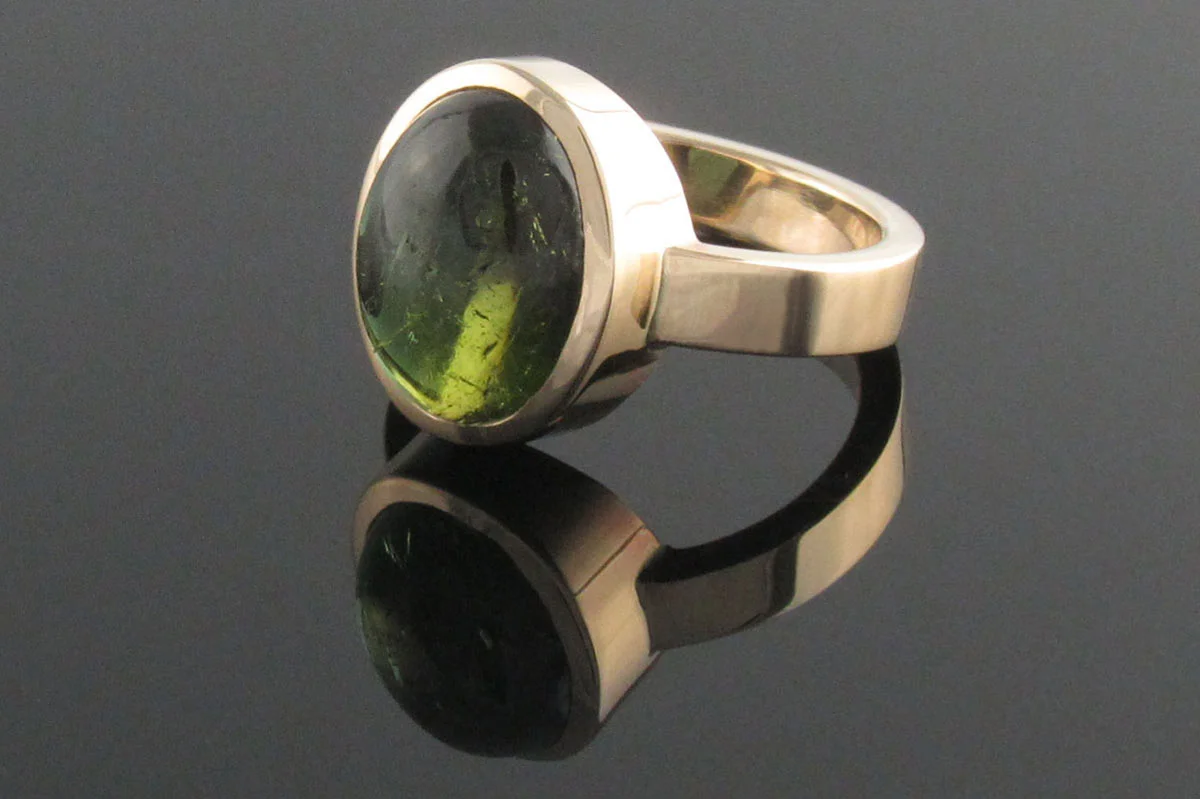 Recycled yellow gold and green tourmaline ring