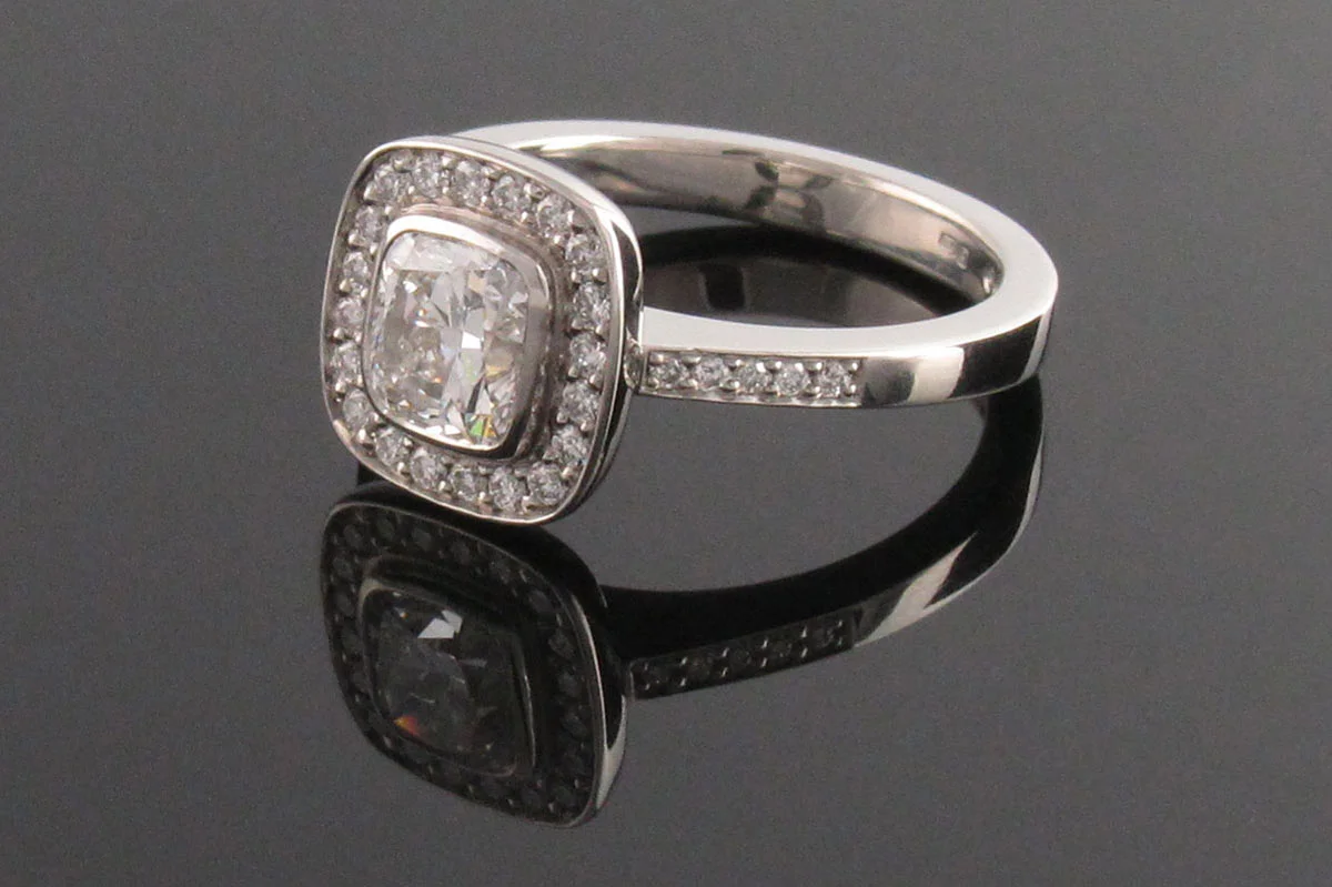 Cushion cut diamond engagement ring