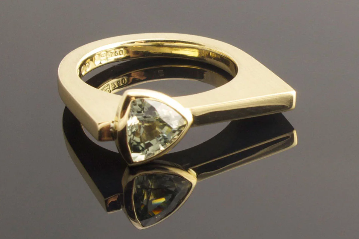 Green trillion sapphire engagement ring