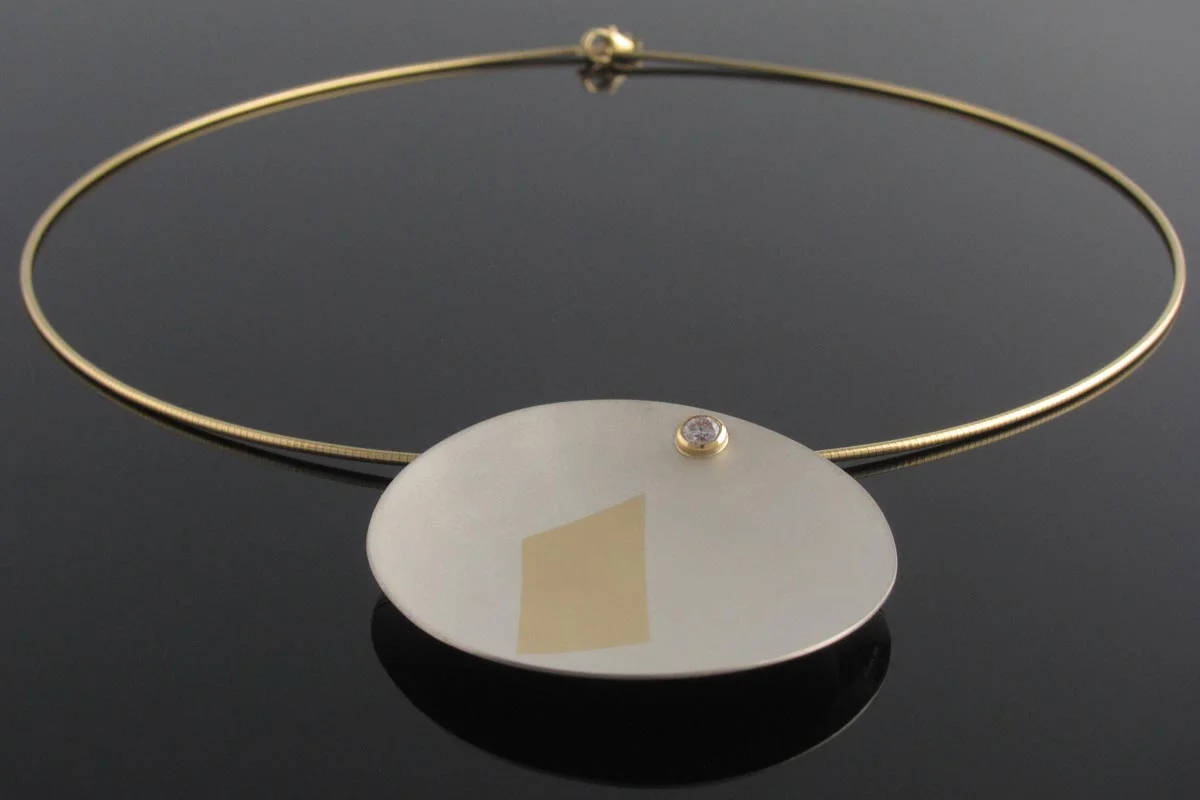 Yellow and white gold pendant with diamond accent