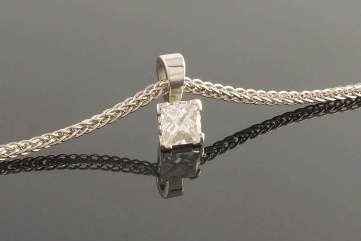 Diamond solitaire pendant