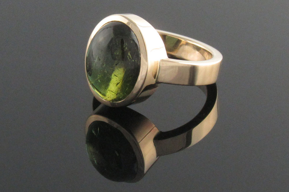 Recycled yellow gold and green tourmaline ring