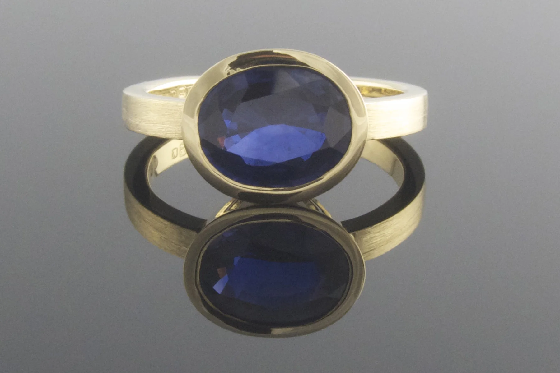 Handmade 18ct yellow gold sapphire engagement ring