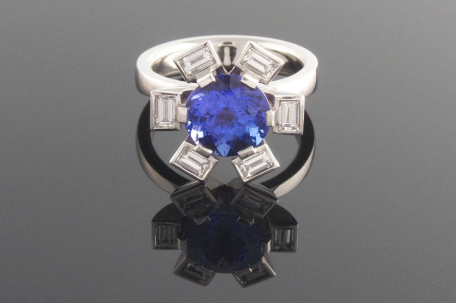 Platinum 6 claw tanzanite and diamond dress ring