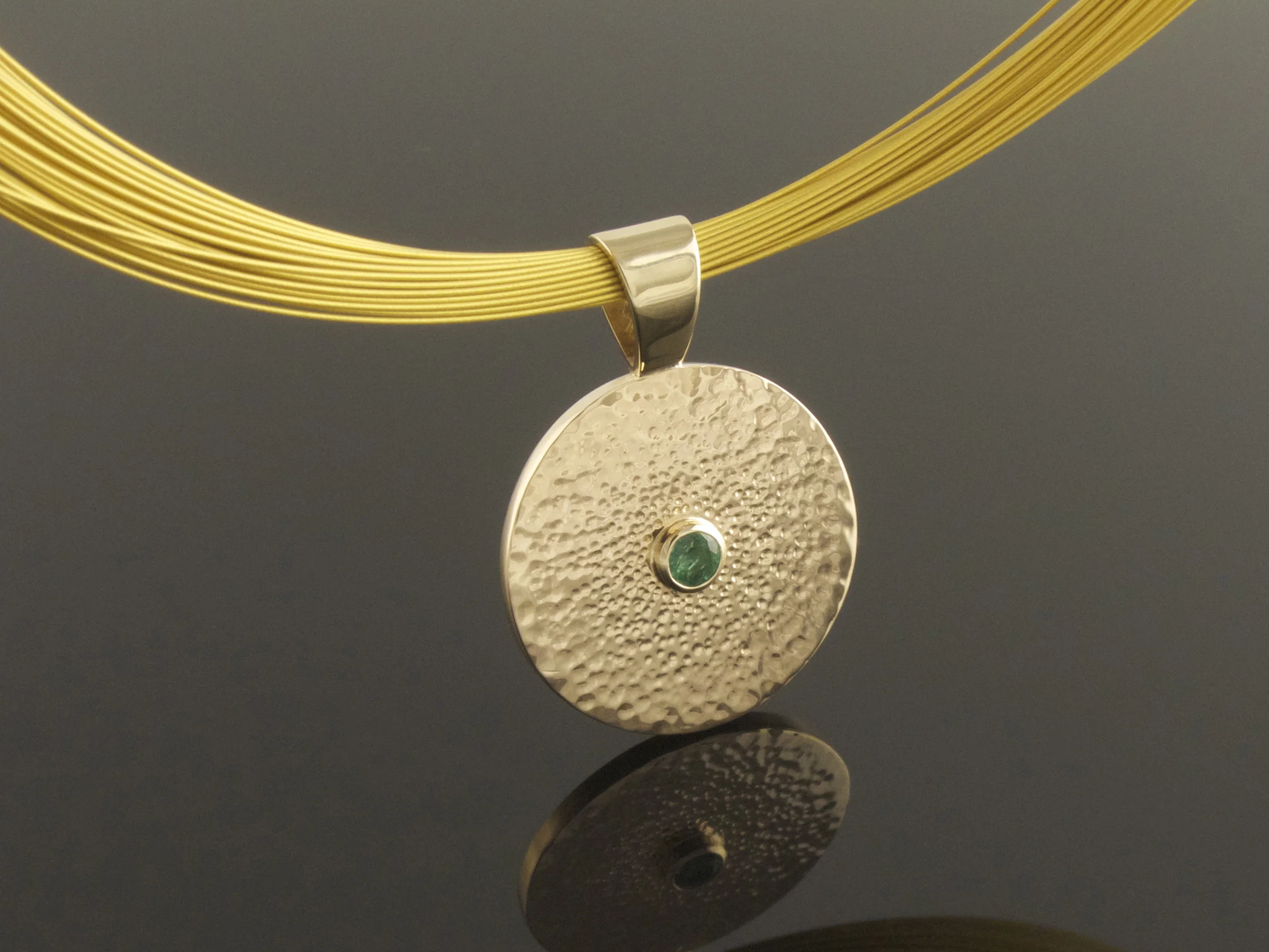 Recycled yellow gold and emerald pendant