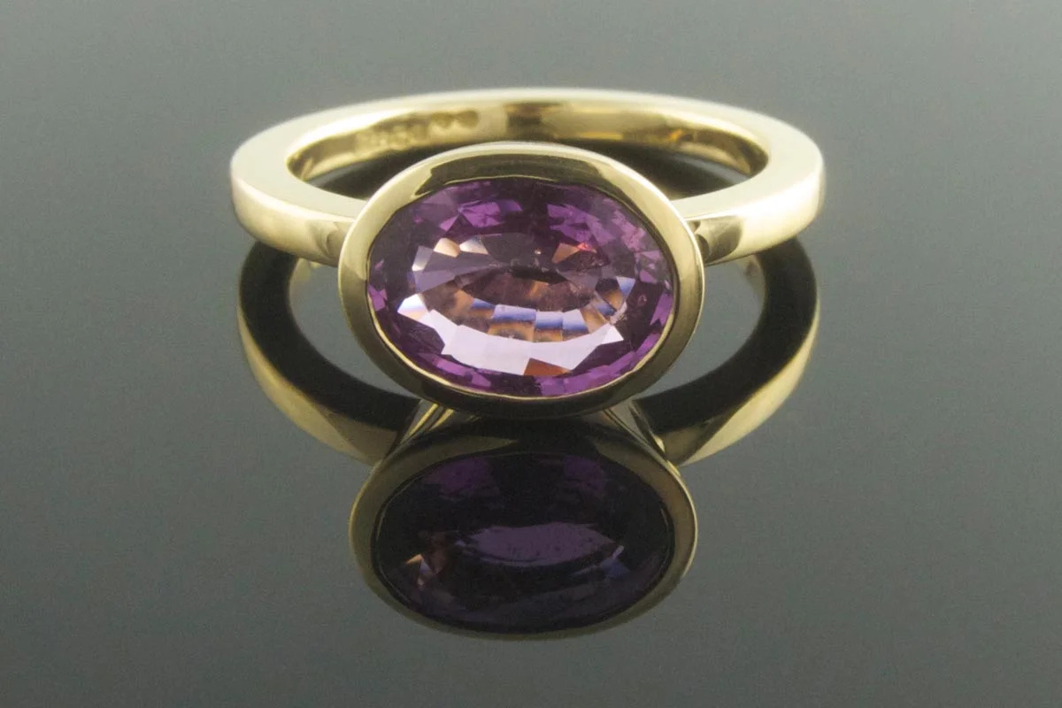 Purple sapphire engagement ring