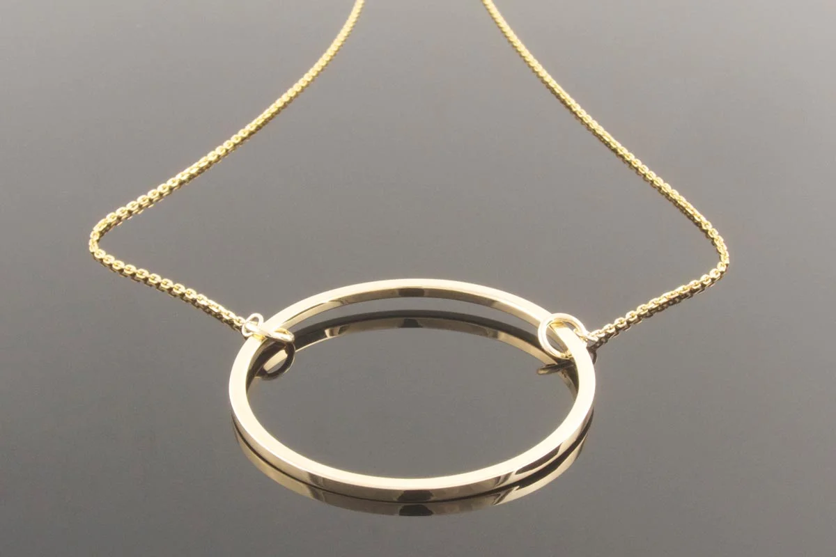 Recycled gold circle pendant