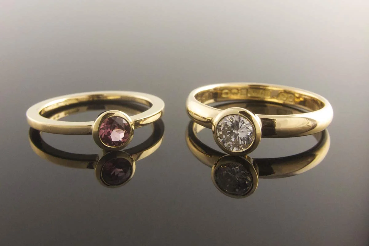 Rhodolite garnet and diamond solitaires