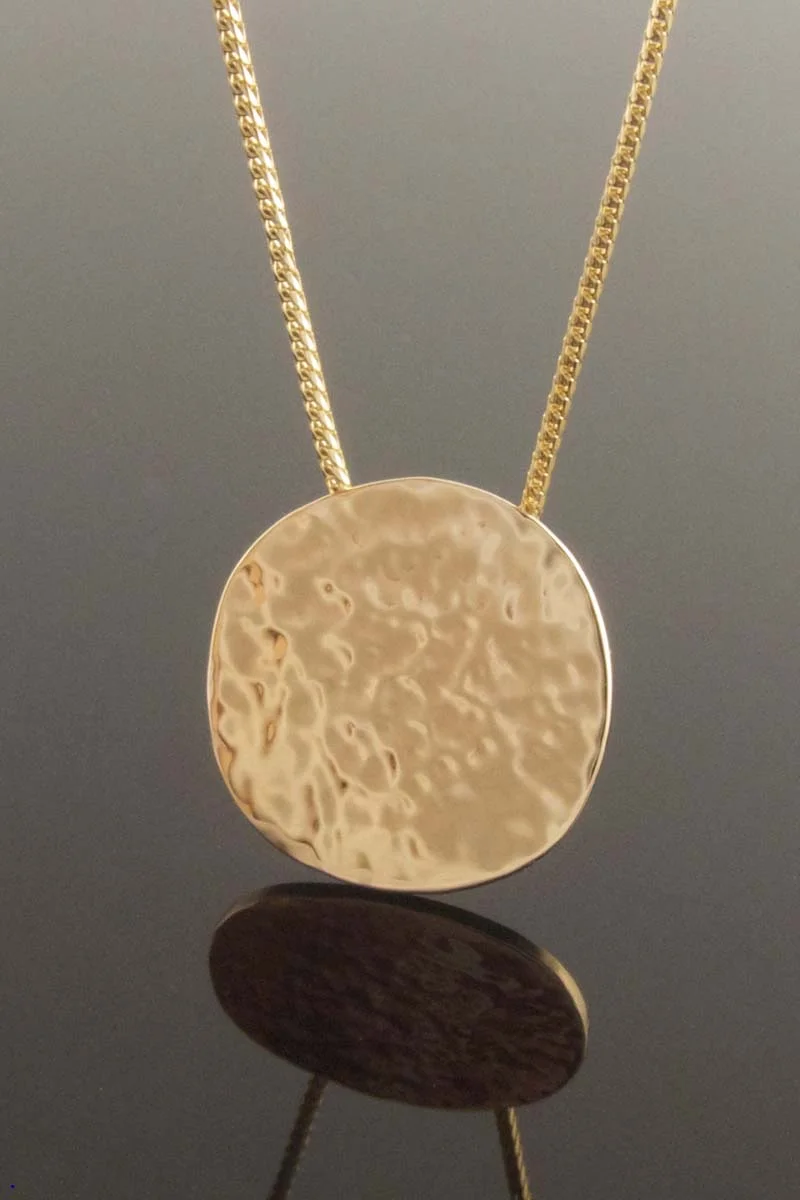 Hammered disc pendant