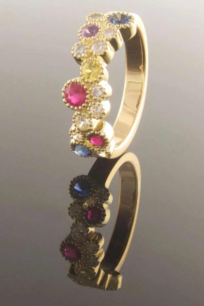 Ruby sapphire and diamond dress ring