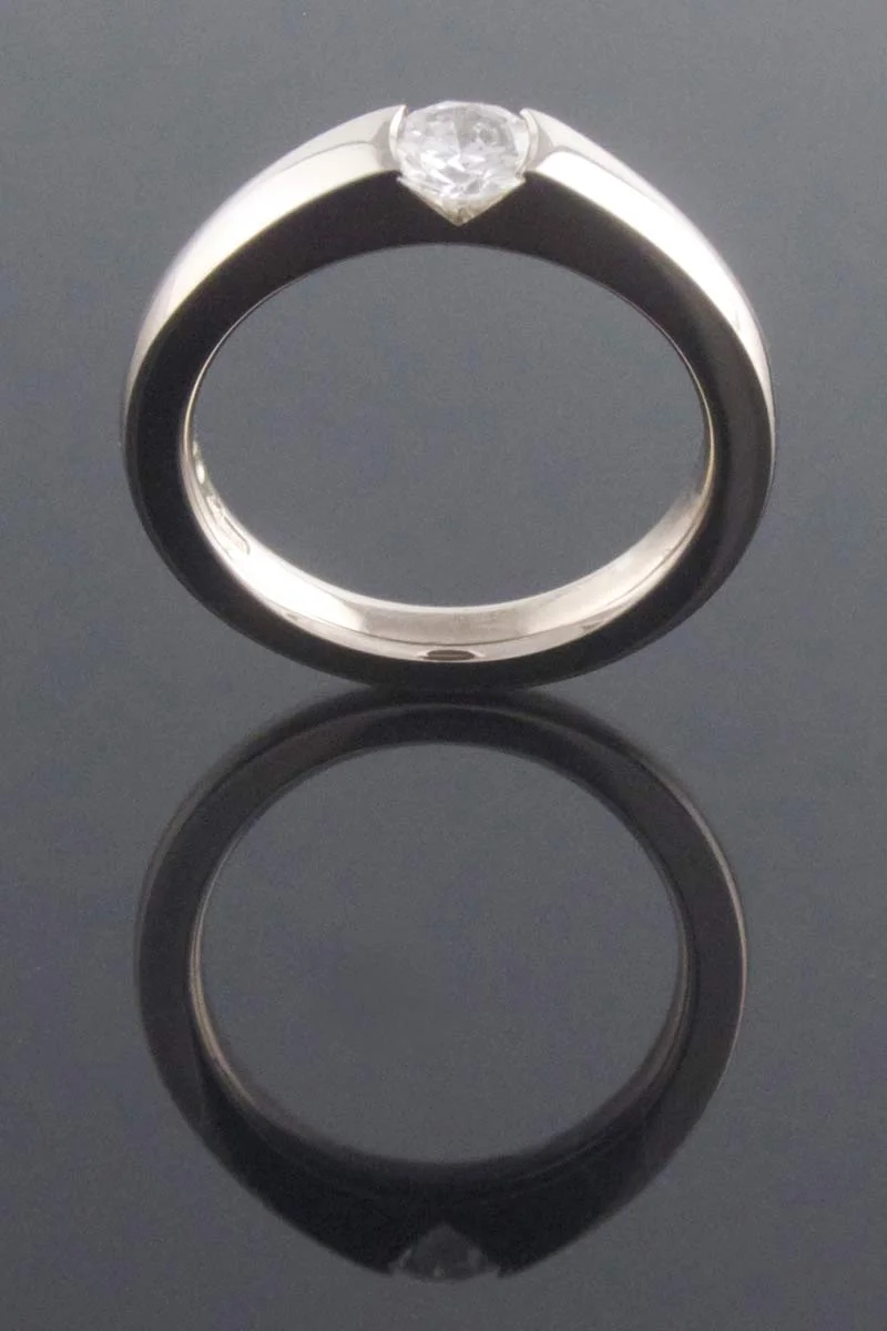 Contemporary white gold diamond solitaire