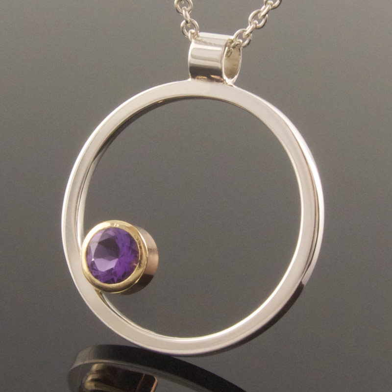 Amethyst-circle-pendant-silver-gold.jpg