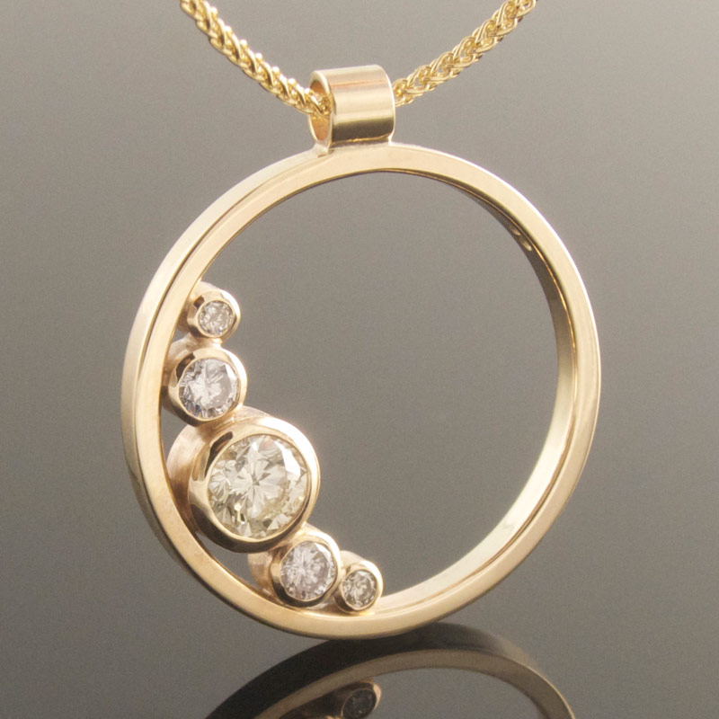 Graduated-5-stone-diamond-circle-pendant.jpg