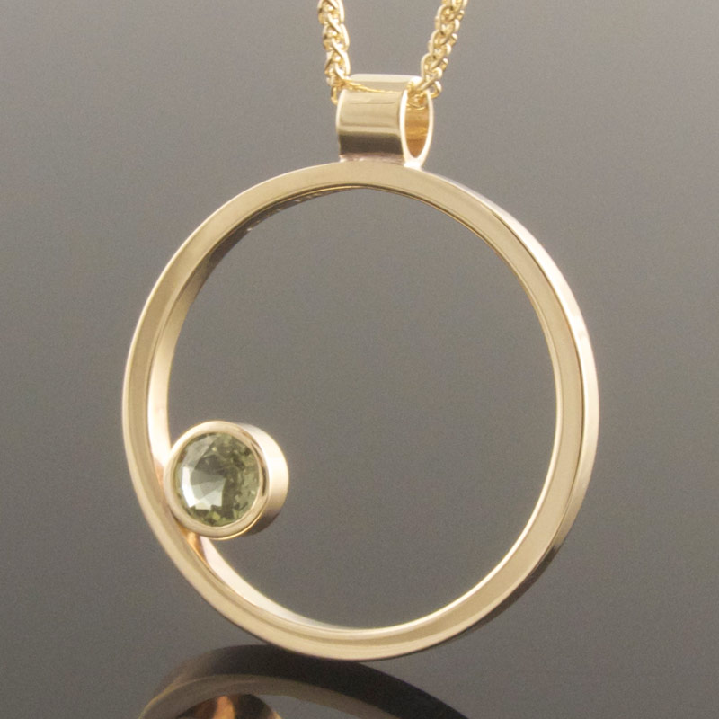 Green-sapphire-circle-pendant-2.jpg