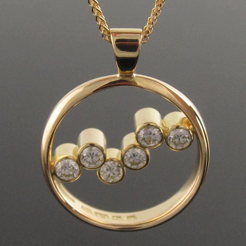 Seven-stone-diamond-circle-pendant.jpg