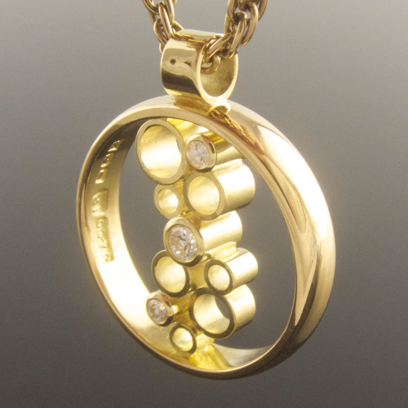 Three-stone-diamond-circle-pendant-with-empties-3.jpg