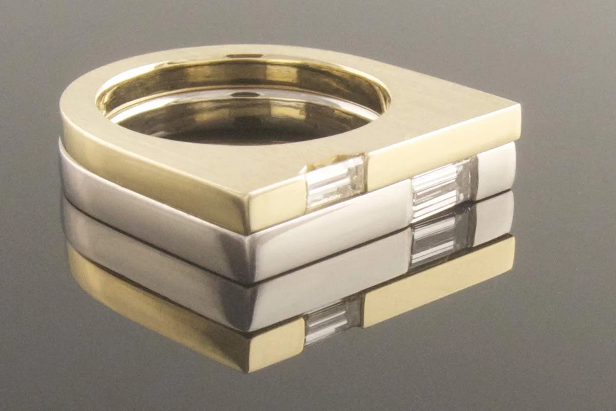 Platinum-and-gold-baguette-diamond-engagement-and-wedding-ring-set.jpg