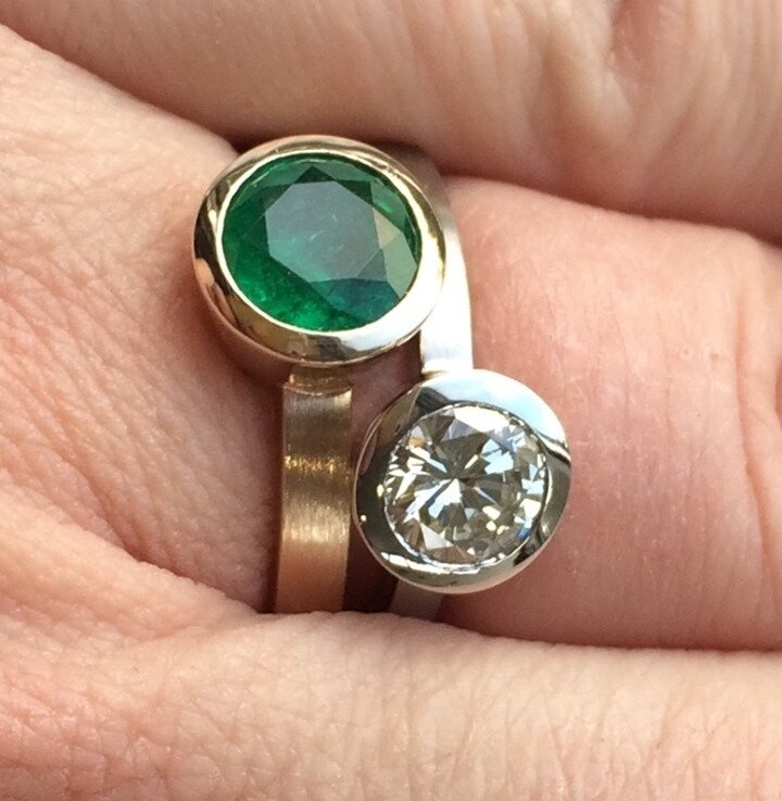 Emerald is May's birthstone and this fabulous emerald was reset in recycled family gold while the vintage diamond was reset in platinum. Would that every grandmother were so generous!