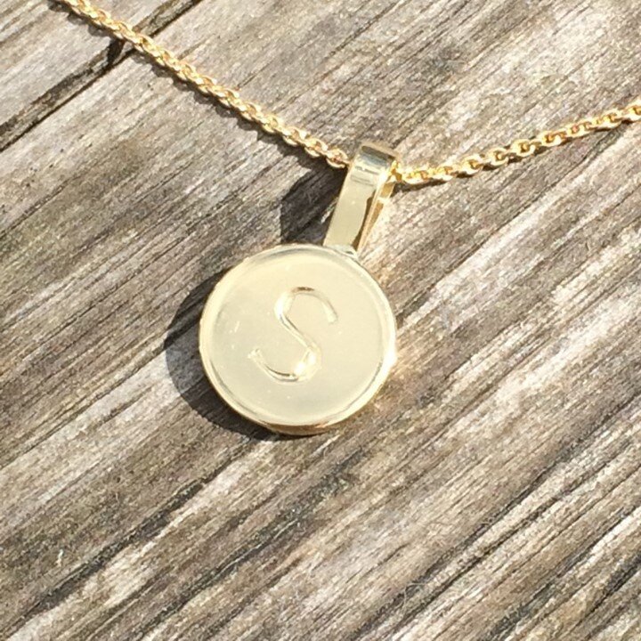 A little handengraved 18ct disc pendant made to mark the birth last month of a beautiful baby boy.