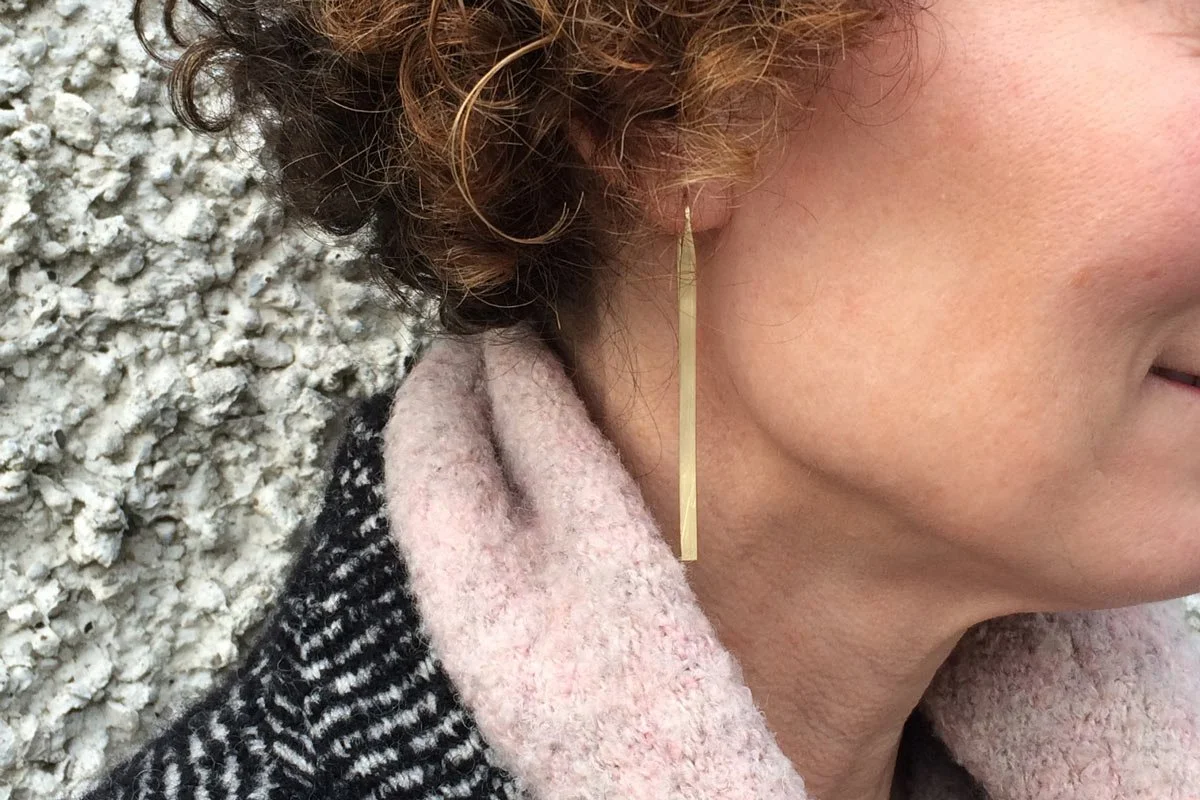 Forged-earrings-on-model.jpg