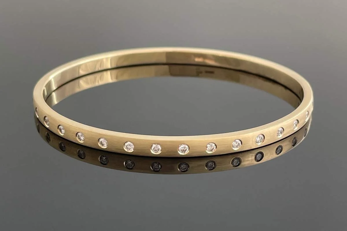 4mm-half-round-gold-bangle-landscape-with-diamonds.jpg