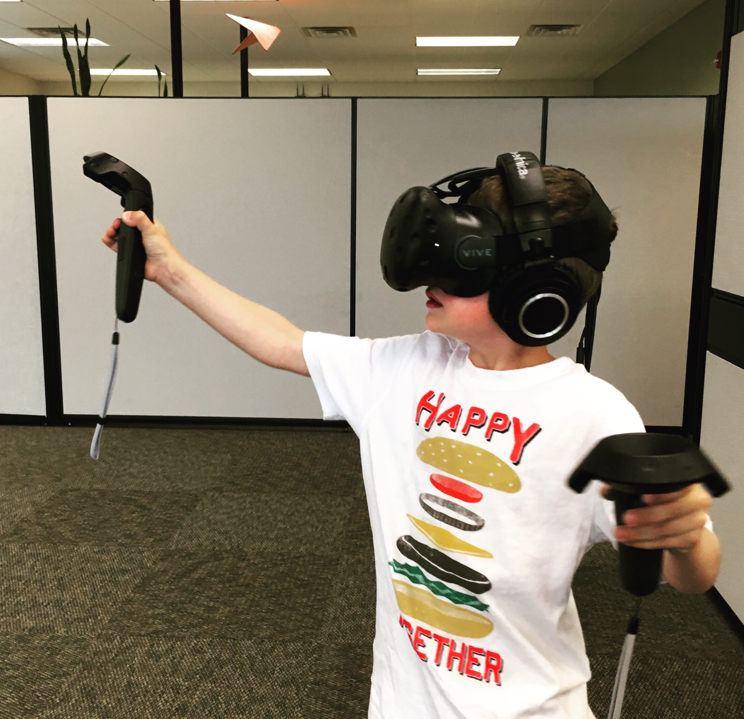 Kid Playing the Vive VR.png