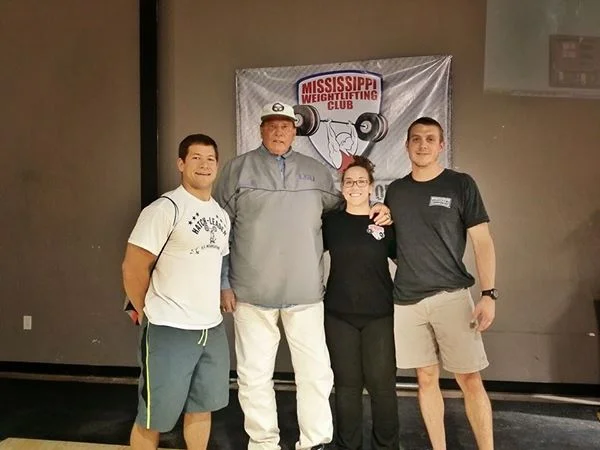 Coach Hatch (center) with Matt Bruce (far left) and MS Barbell's Amber and Tyler at the 2014 MS Weightlifting Championship