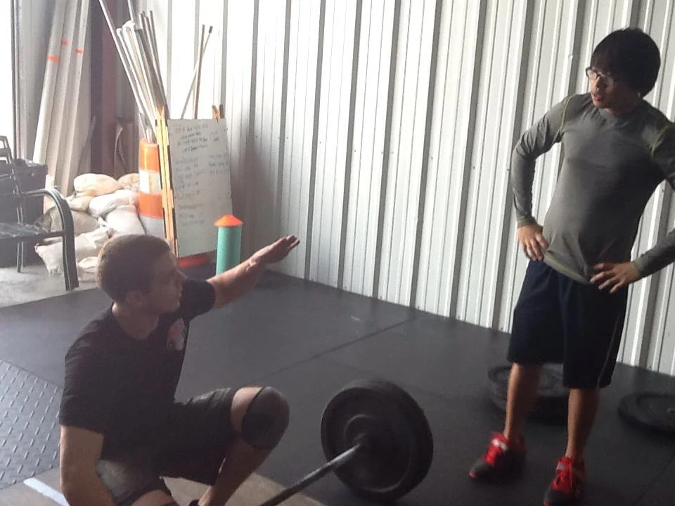 Coach Smith giving real time feedback during the practical break out sessions. Photo credit: Amber Sheppard