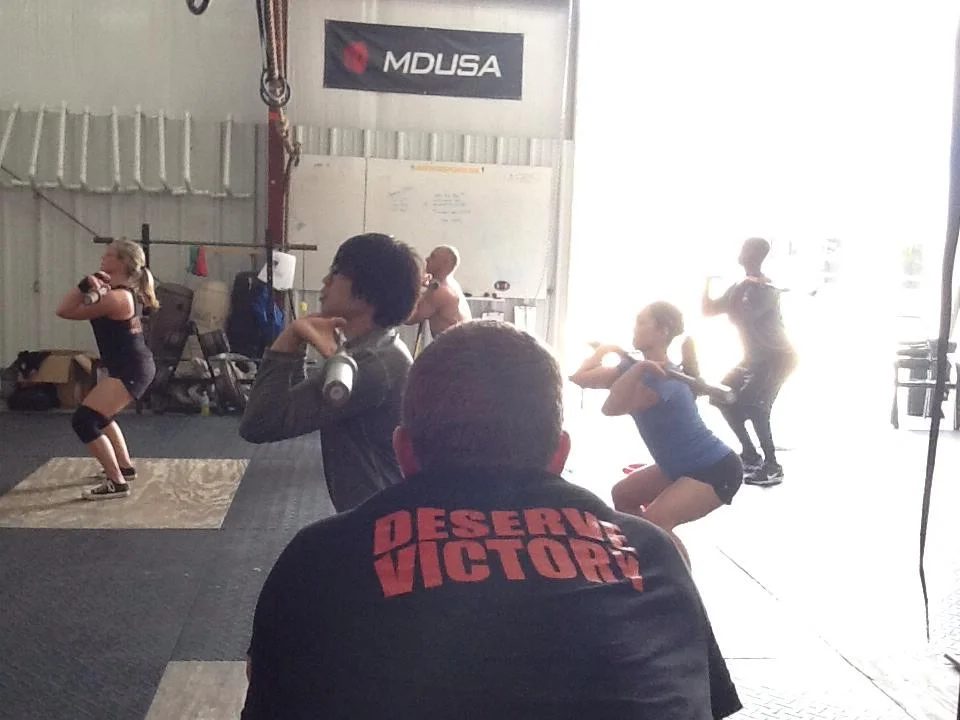 Coach Smith watching the group in D'Iberville, Mississippi. Photo credit: Amber Sheppard