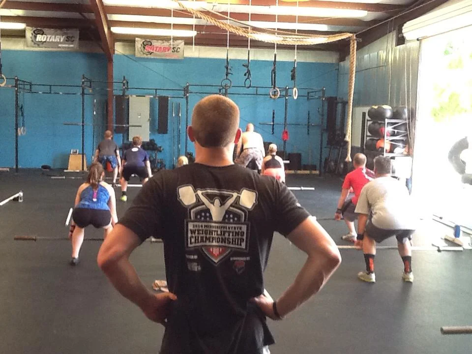 Coach Smith directing progressions in an Alabama seminar. Photo credit: Amber Sheppard